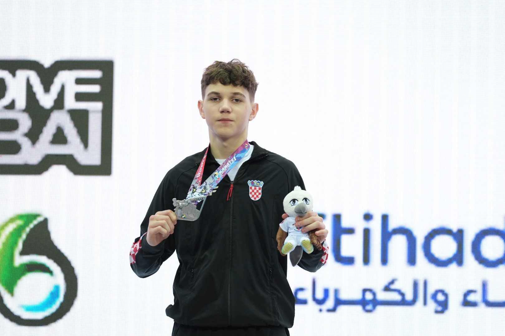 Petar Slukić s medaljom